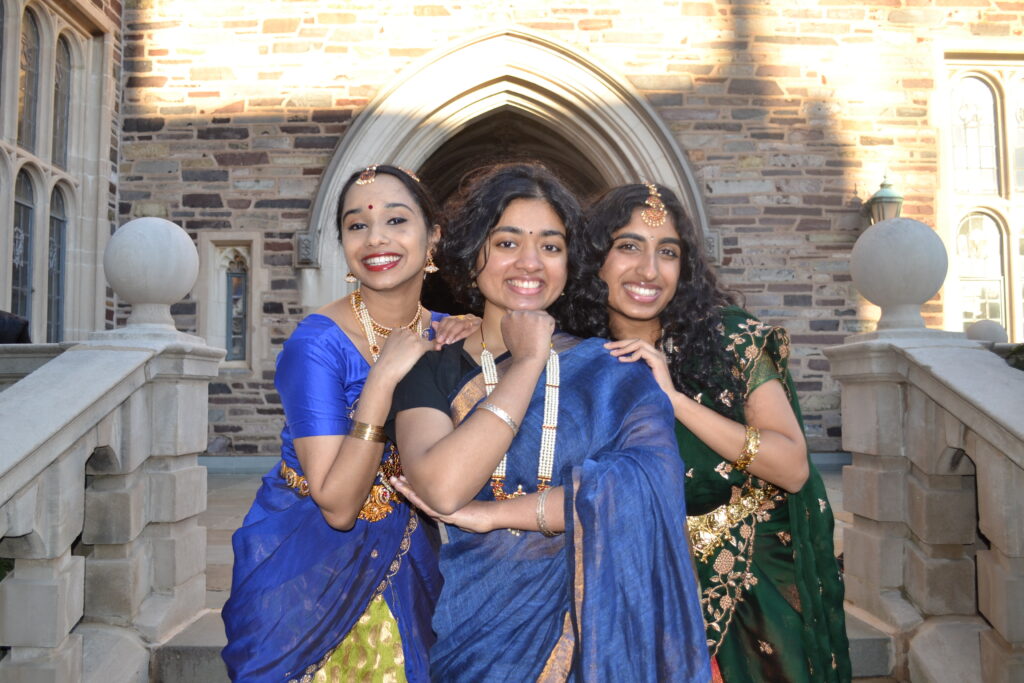 Samyukta Neeraj '25, Shabnam Sahay (GS), Vibha Srinivasan '26 smiling at the camera