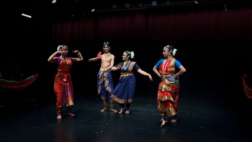 A scene with Shiva, Justin Shields '25, and Parvati, Aashna Pandey '27, during the 2025 Rangapravesha Show